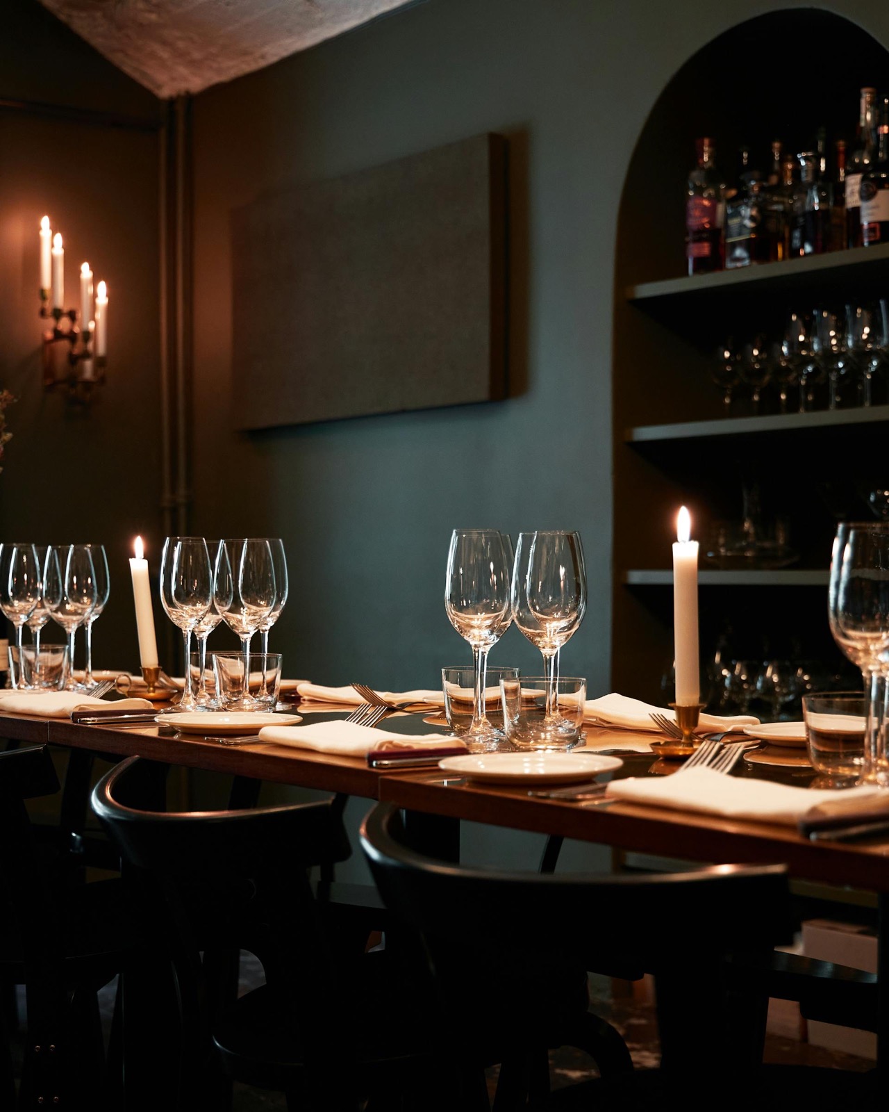 Bosq Aspen dining room — Michelin-starred 30-seat restaurant at 312 S Mill Street, candlelit with juniper hearth